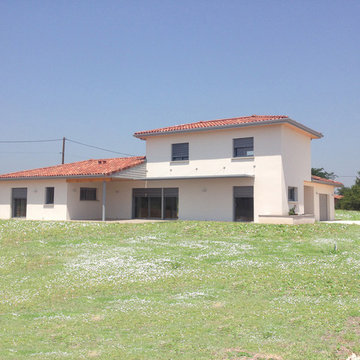 Maison contemporaine à étage et terrasse couverte