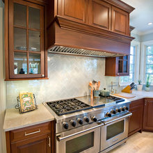 60" range and small cabinets on side