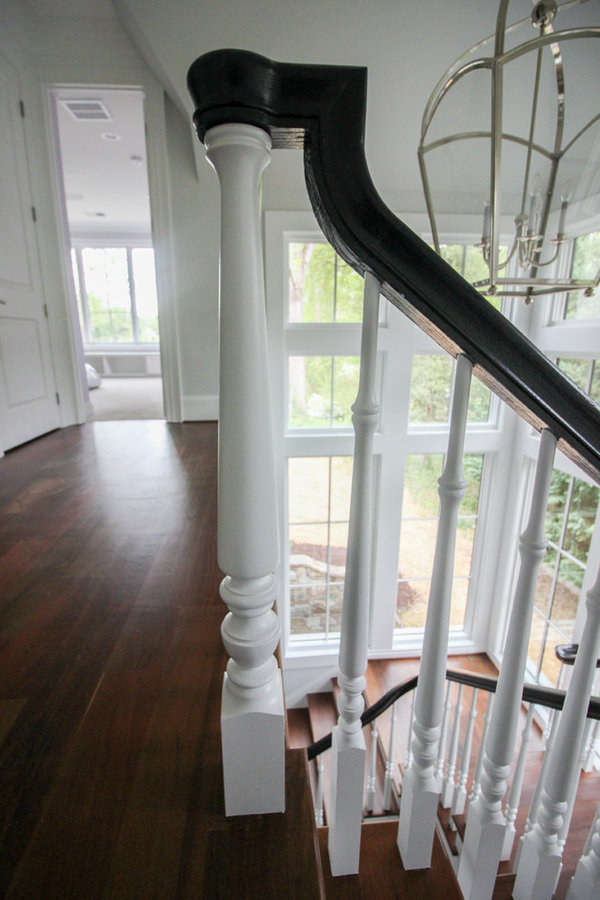 Powerful Impression by Floating Staircase in Suburban Foyer