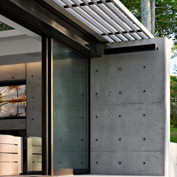 Waterfront Stone Modern Home and Pool House