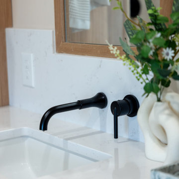 Primary & Guest Bathroom Remodel with Improved Layout and Heated Terrazzo Floors