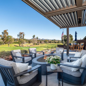 Modern Covered Patio with Fire Pit Seating and Golf Course Views