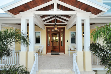 Example of a beach style entryway design in Tampa