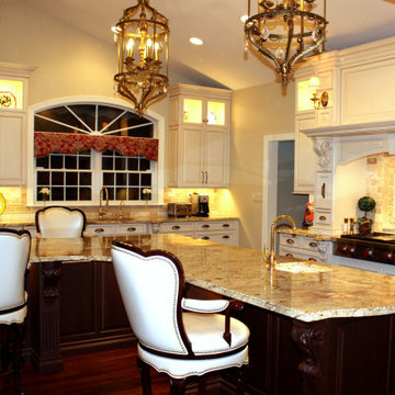 Luxurious Mediterranean Kitchen With A Custom Wood Hood And A Cherry Island
