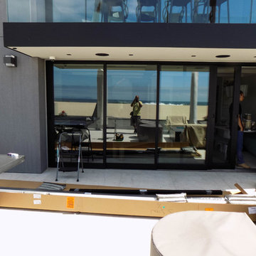 Beach House Motorized Power Screen in Newport Beach, California
