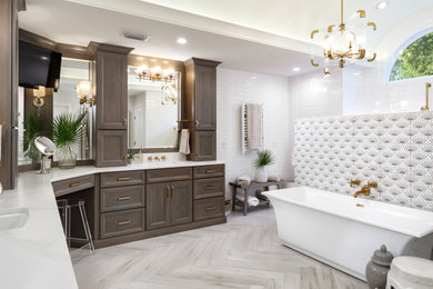 Example of a huge transitional master white tile and porcelain tile porcelain tile, gray floor, double-sink and vaulted ceiling bathroom design in Jacksonville with recessed-panel cabinets, medium tone wood cabinets, a two-piece toilet, white walls, an undermount sink, quartz countertops, white countertops and a built-in vanity