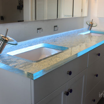 Inspired LED Color Changing RGB Flex Illuminating a Bathroom Countertop