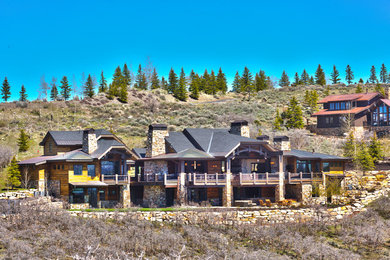 Example of a mountain style home design design in Salt Lake City