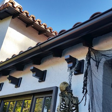 Half Round Rain Gutters with Wrap Around 10 Gauge Twisted Rafter Mount Brackets