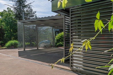 Exemple d'un petit carport attenant tendance.