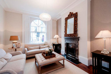 Transitional living room in London.