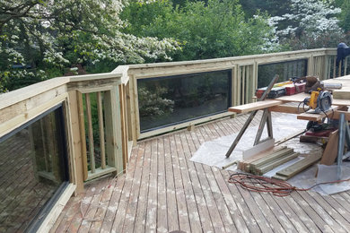 Railings with glass views, Flying Soffit with LED lighting , Deck renovation.