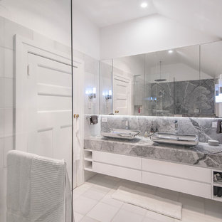 Design ideas for a mid-sized contemporary master bathroom in Brisbane with flat-panel cabinets, an alcove shower, ceramic tile, white walls, a vessel sink, marble benchtops, white floor, an open shower, grey benchtops, white cabinets and gray tile.