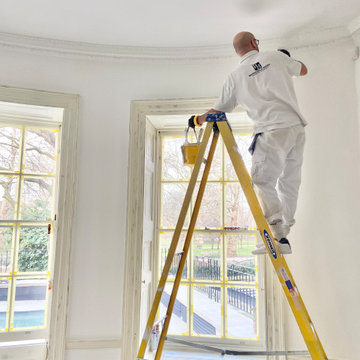 Danny Painting a Cornice