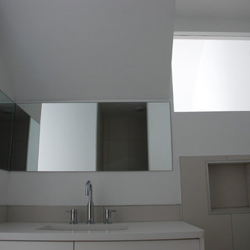 4-pc bathroom borrows light from staircase