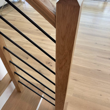 Project #140 | White Oak Staircase with Horizontal Bar Rail