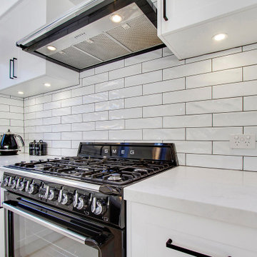 White Subway Tile Splashback Over Gas Cook Top and Stone