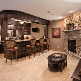 Design ideas for a traditional basement in Minneapolis with a corner fireplace.