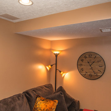 Finished basement with exercise area and small bath in Wexford, PA