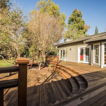 Curved Redwood Deck with Hot Tub: Fair Oaks, CA