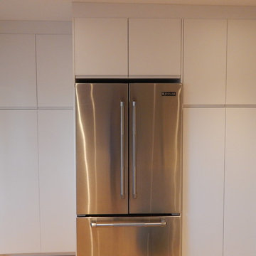 Open-Concept Ground Floor Reno with Customized IKEA Kitchen and Custom Staircase