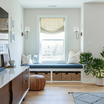 Loft Media Corner with Custom Built-In Window Seat & Storage Baskets