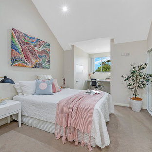 Inspiration for a modern bedroom in Sydney with beige walls, carpet and beige floor.
