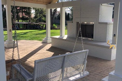 Example of a sunroom design in Other