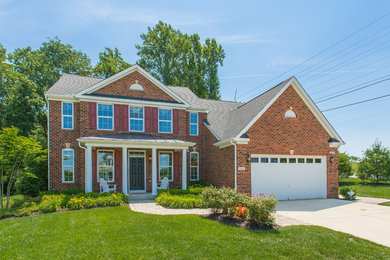 Mid-sized traditional two-story mixed siding gable roof idea in DC Metro