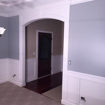 Custom designed, built installed wainscoating and crown molding