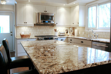 Mid-sized trendy l-shaped vinyl floor eat-in kitchen photo in Other with a double-bowl sink, shaker cabinets, white cabinets, beige backsplash, stainless steel appliances, an island, soapstone countertops and ceramic backsplash