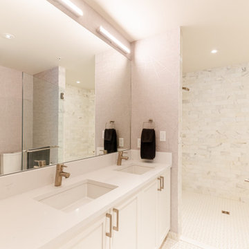 Primary Bathroom Vanity with Updated Mirror and Lighting