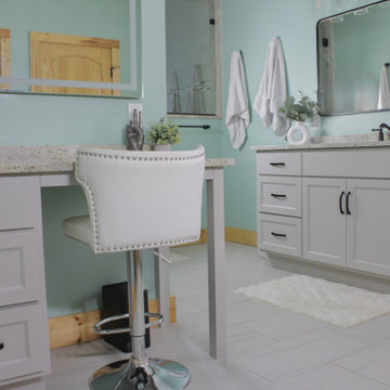 A double vanity with a separate makeup vanity