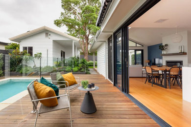This is an example of a beach style home design in Sydney.