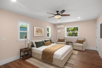 Inspiration for a mid-sized transitional vinyl floor and brown floor bedroom remodel in Portland with beige walls