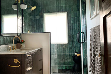 Example of a mid-sized trendy green tile and porcelain tile porcelain tile, black floor and single-sink corner shower design in Chicago with dark wood cabinets, a one-piece toilet, white walls, quartz countertops, a hinged shower door and a freestanding vanity