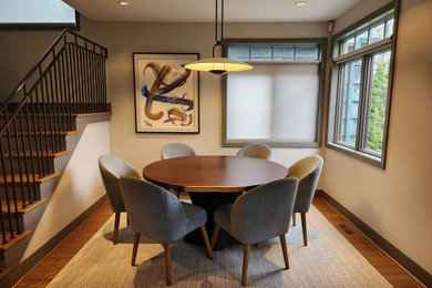 Example of a transitional dining room design in Seattle
