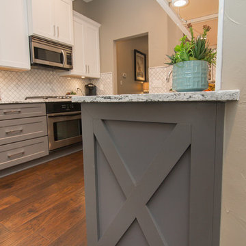 Kitchen | Two-Tone Cabinets | Cambria Quartz | Arabesque Marble Backsplash