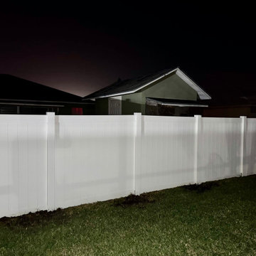White vinyl fence