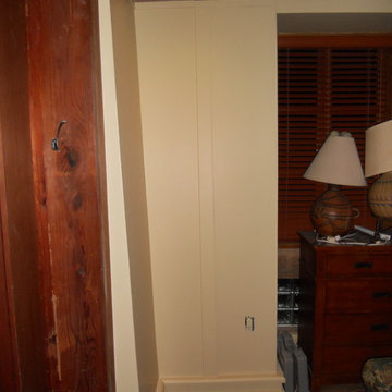 Adobe house dust control. Sheetrock level finish in bedroom.