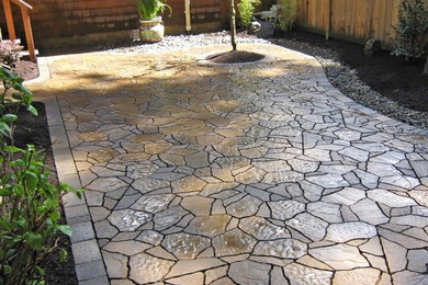 Design ideas for a mid-sized traditional backyard patio in San Francisco with a fire feature, brick pavers and no cover.