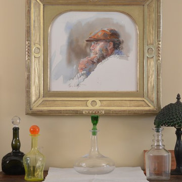 inspired by Italian frames this hand made frame, carved and water gilded in 18kt