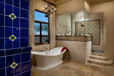 Bathroom - large mediterranean master multicolored tile and ceramic tile travertine floor bathroom idea in Phoenix with beige walls