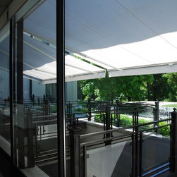 Alutex Cape Code Awnings over gorgeous sliding kitchen doors. - Awnings