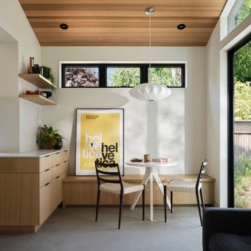 Light-Filled ADU Dining Space with Cedar Ceiling and Sliding Glass Door