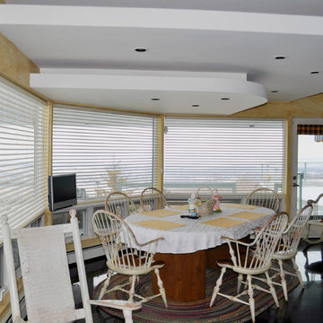 Large bay of windows can lose and gain a LOT of heat. Odysee blinds help.