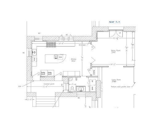 Design for large eat in kitchen with 3 windows and multiple doors