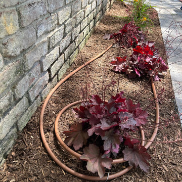 Merrick | Traditional New Nicolock Paver Patio, Fiberon Decking, and Landscaping