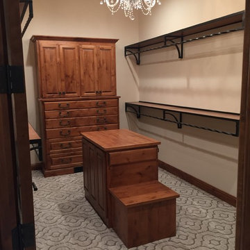 Walk-in closet knotty alder cabinety