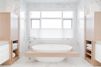 Large trendy master white tile and porcelain tile porcelain tile bathroom photo in Calgary with shaker cabinets, light wood cabinets, a one-piece toilet, white walls, an undermount sink and quartzite countertops